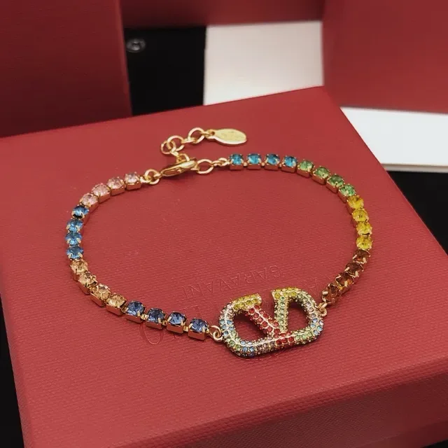 Rainbow Crystal-Encrusted Gold-Tone V Motif Bracelet 6