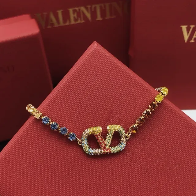 Rainbow Crystal-Encrusted Gold-Tone V Motif Bracelet 7