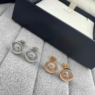 Silver and Rose Gold Rotating Disc Stud Earrings