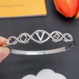 Bracelete de tom prateado com motivo de onda pavé e openwork