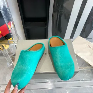 Mulas de peluche turquesa