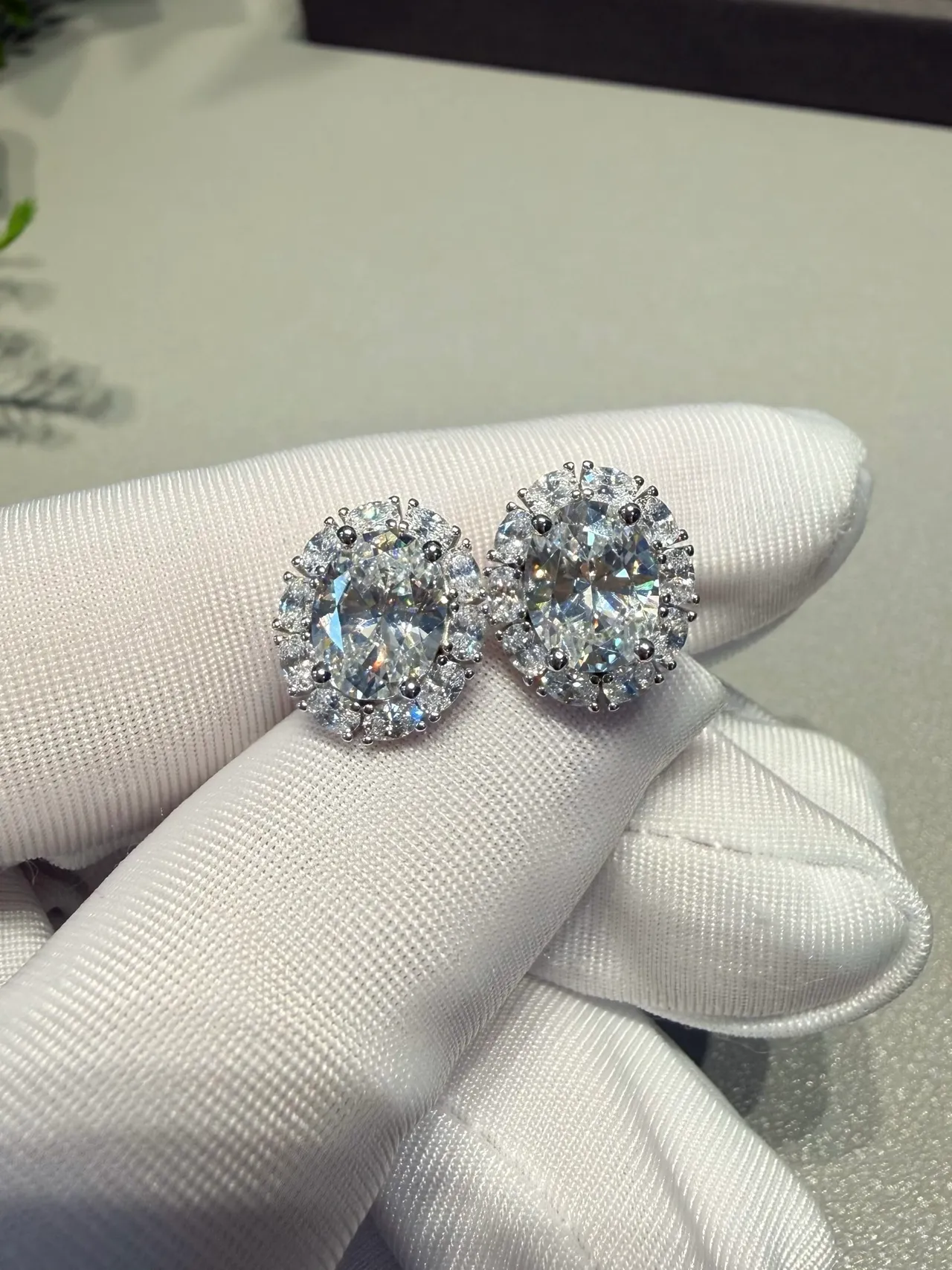 White Silver Oval-Cut Center Stone Halo Setting Earrings 9