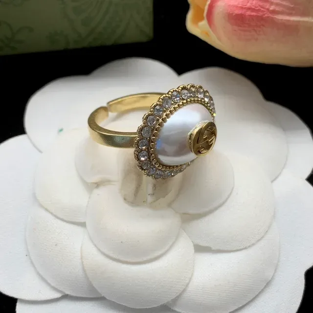 Gucci GG Marmont Gold White Oval Pearl Centerpiece Crystal-Encrusted Halo Ring 2