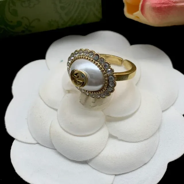 Gucci GG Marmont Gold White Oval Pearl Centerpiece Crystal-Encrusted Halo Ring 5