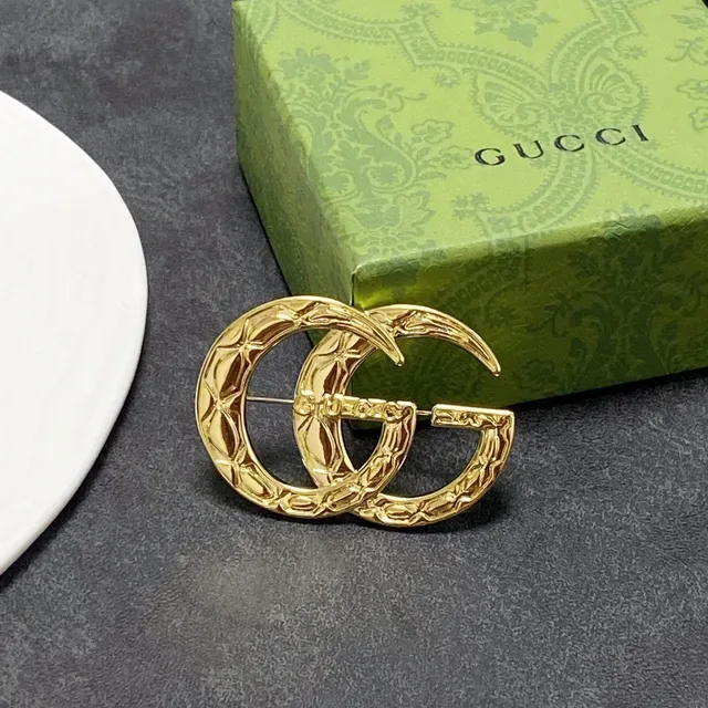 Broche Gucci GG Marmont Matelassée Dorée Interlocking G 6