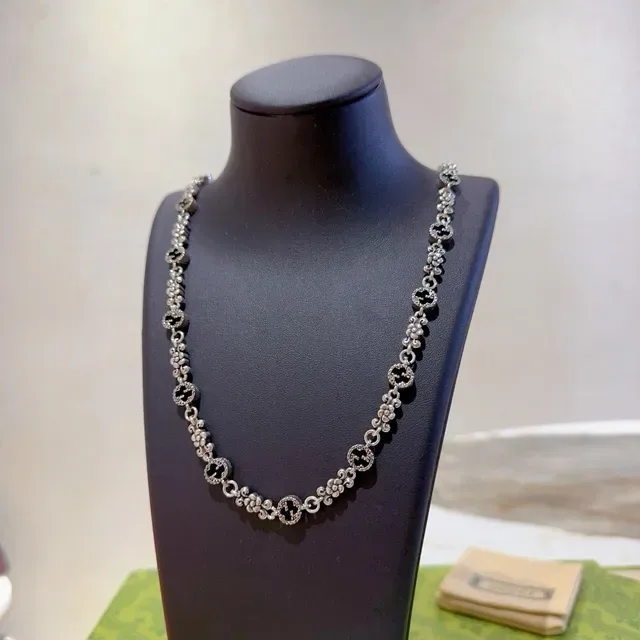 Gucci Interlocking G and Floral Motif Silver-Tone Necklace 9