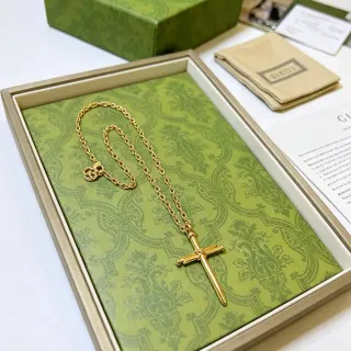 Gucci Knotted Sword Cross Gold-Tone Necklace