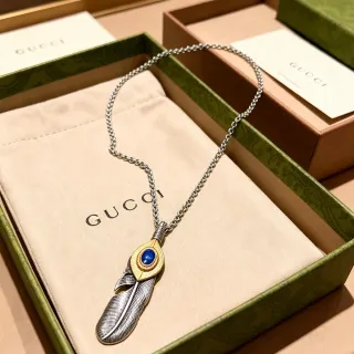 Gucci Pendentif en forme de plume argenté bleu en métal bicolore