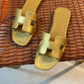 Hermès Oran Slide Metallic Gold Leather Slippers