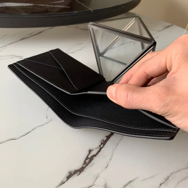 Louis Vuitton Black Pebbled Leather Embossed Monogram Short Wallet 3