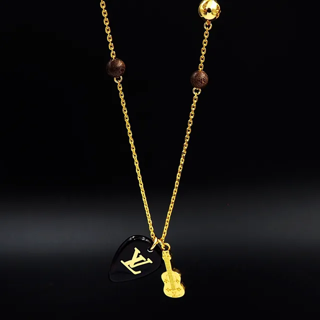 Louis Vuitton Black Resin Guitar Pick and Mini Guitar Charm Necklace 5