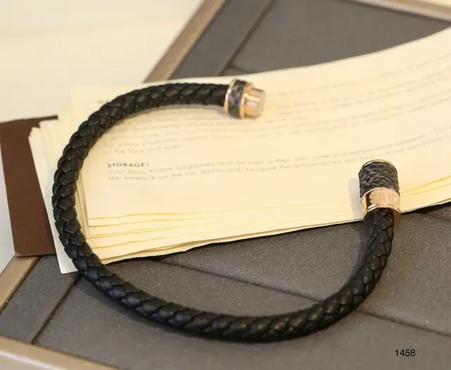 Louis Vuitton Black Silver Braided Leather Cylindrical Metal Clasp Bracelet 5