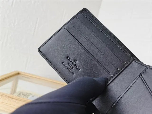 Louis Vuitton Embossed Monogram Cuir Granulé Noir Portefeuille Court 2