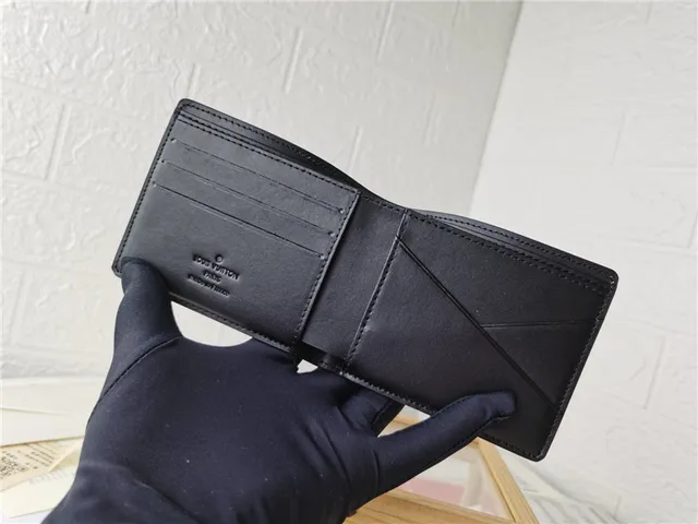 Louis Vuitton Embossed Monogram Cuir Granulé Noir Portefeuille Court 4