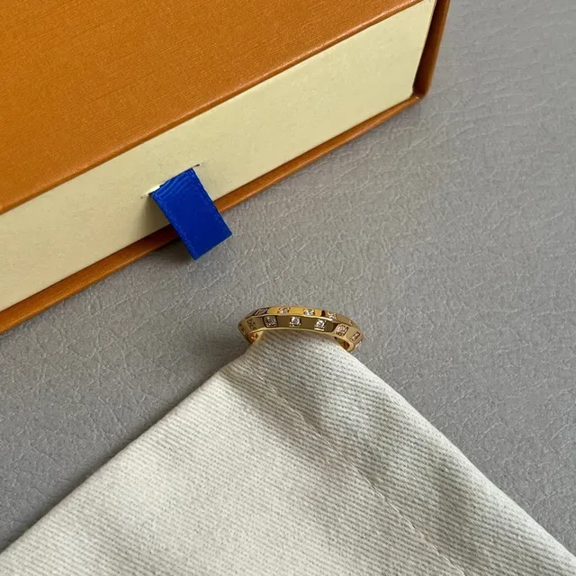 Louis Vuitton Gold Channel-Set Diamond Ring 3