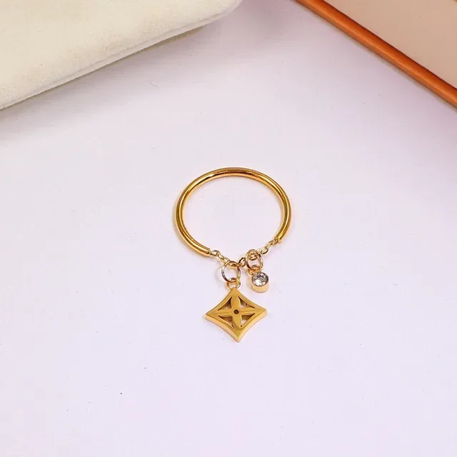 Louis Vuitton Anel de metal com charms pendentes em ouro e prata com monograma 5