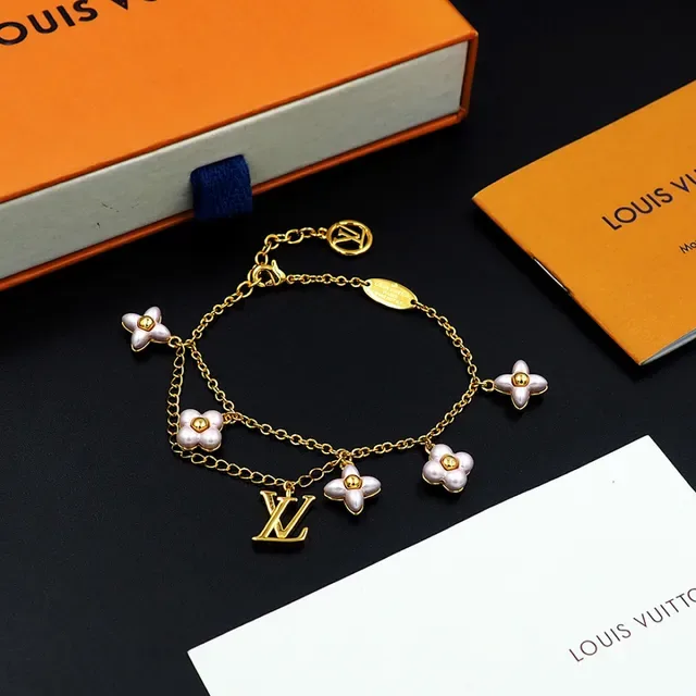 Louis Vuitton Gold-Tone Floral Charm Bracelet 6