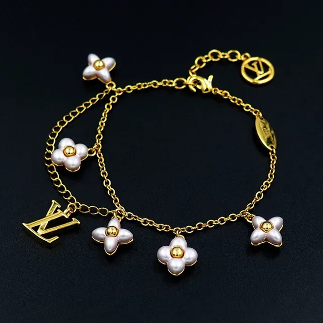 Louis Vuitton Gold-Tone Floral Charm Bracelet 8