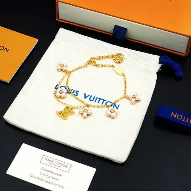 Louis Vuitton Gold-Tone Floral Charm Bracelet 10