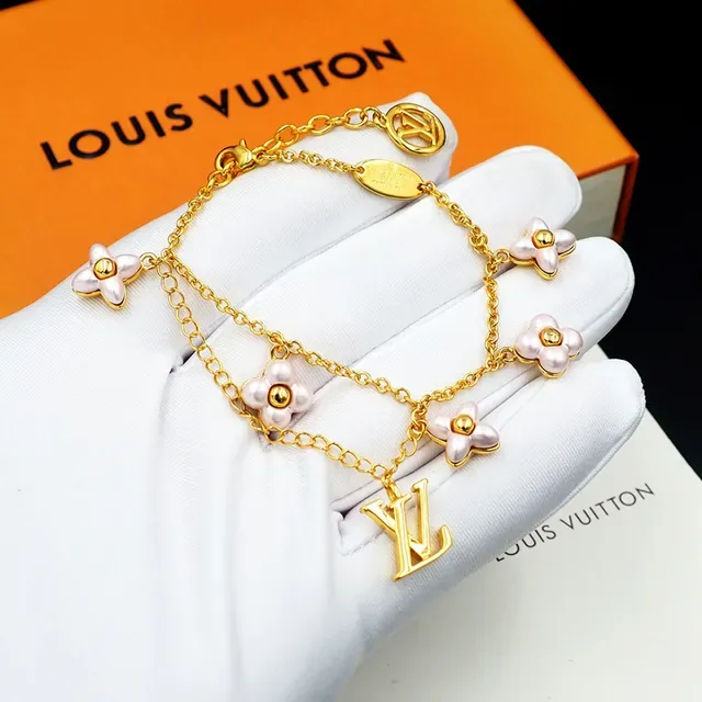 Louis Vuitton Gold-Tone Floral Charm Bracelet 11