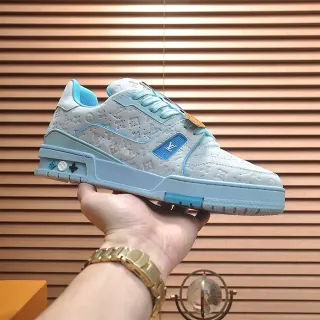 Louis Vuitton gris azul monograma embossado cuero layered esculturado suela media lifestyle sneakers