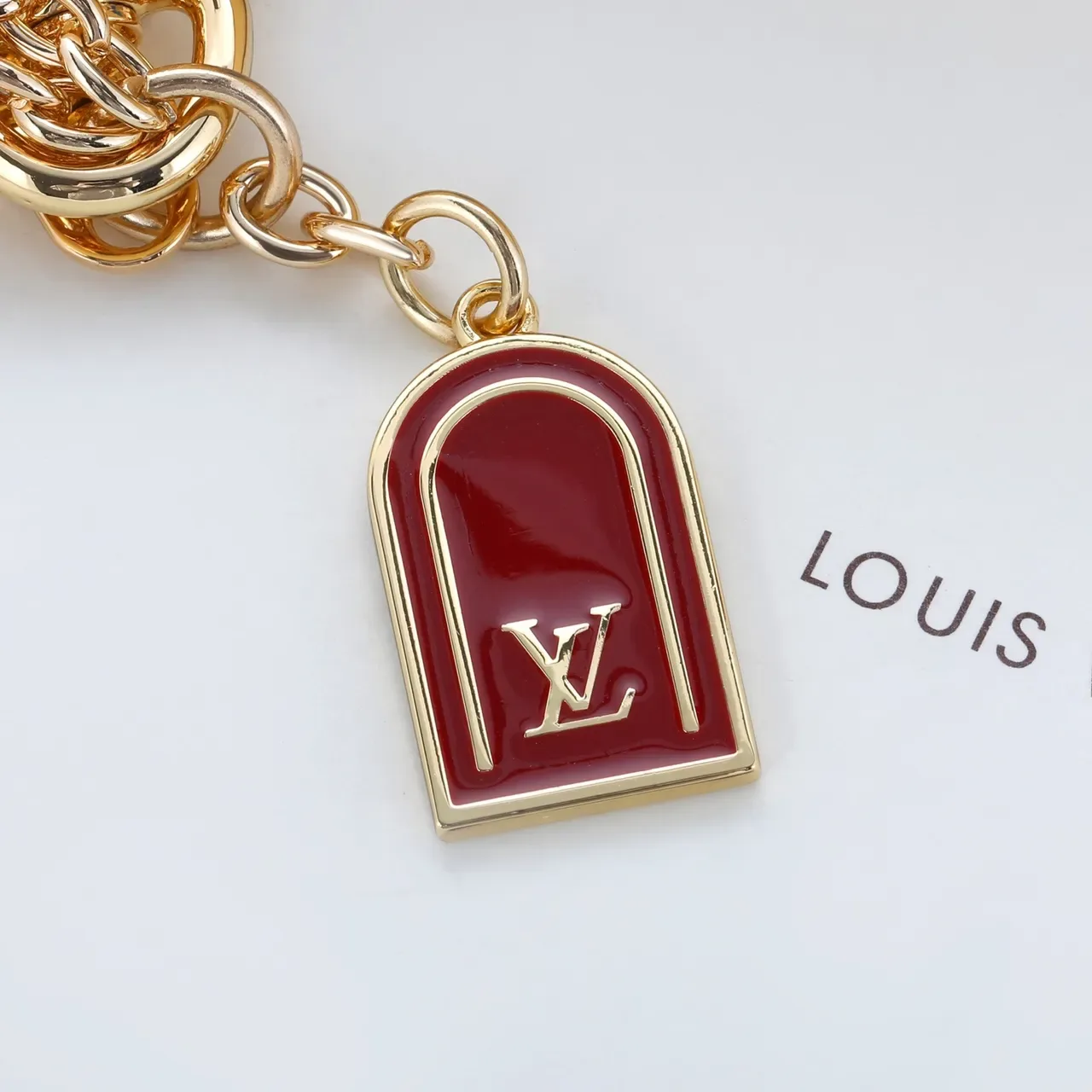 Louis Vuitton Lock & Key Red Enamel Gold-Tone Charm Bracelet 3