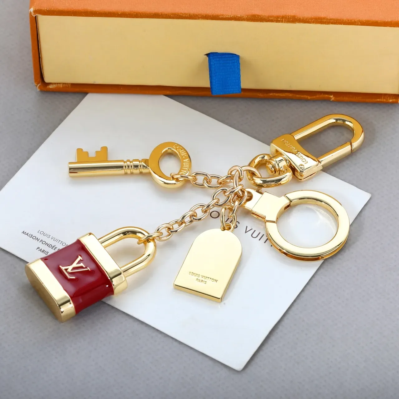 Louis Vuitton Lock & Key Red Enamel Gold-Tone Charm Bracelet 8