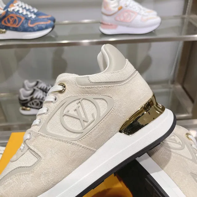 Louis Vuitton LV Trainer Beige Gold Textured Textile Upper Sculpted White Midsole Lifestyle Sneakers 3
