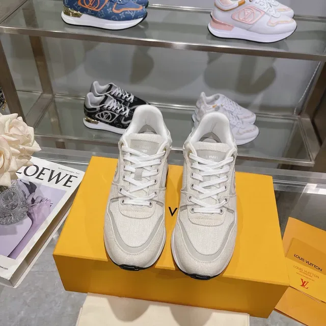 Louis Vuitton LV Trainer Beige Gold Textured Textile Upper Sculpted White Midsole Lifestyle Sneakers 6