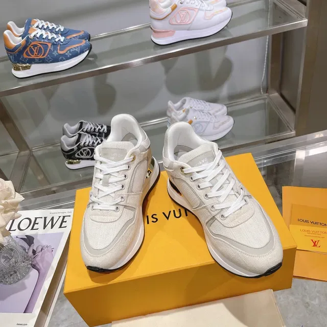 Louis Vuitton LV Trainer Beige Gold Textured Textile Upper Sculpted White Midsole Lifestyle Sneakers 7