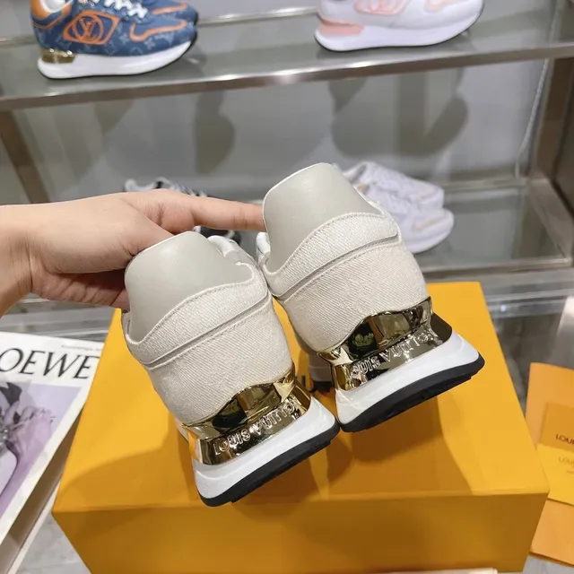 Louis Vuitton LV Trainer Beige Gold Textured Textile Upper Sculpted White Midsole Lifestyle Sneakers 8