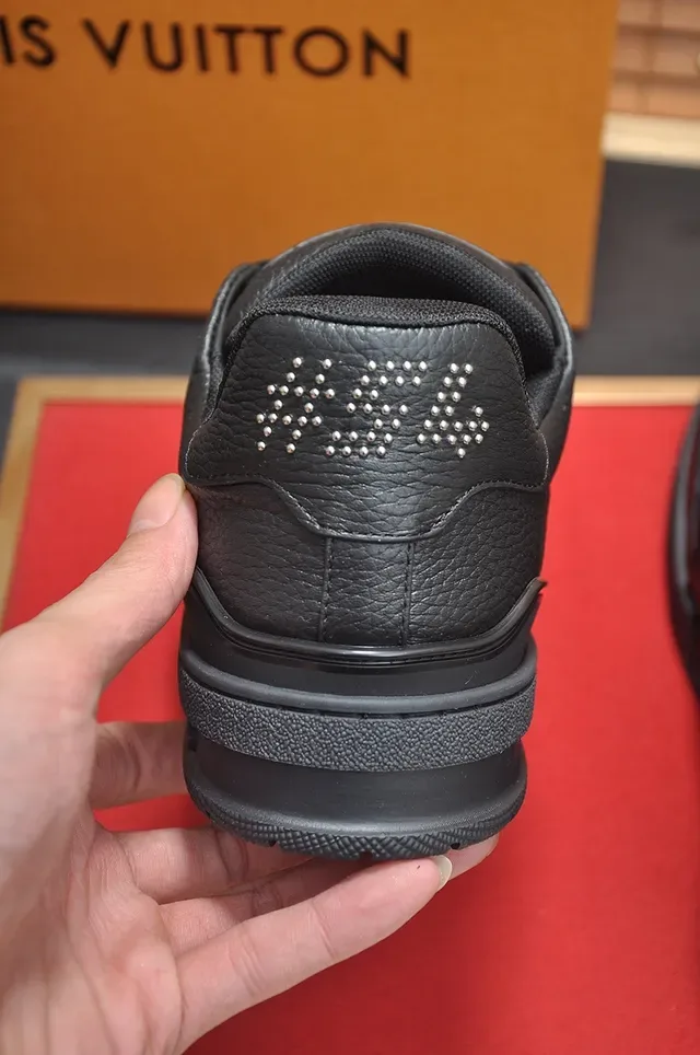 Louis Vuitton LV Trainer Noir et Or Cuir grainé Semelle Intermédiaire en Caoutchouc Multicouche Chaussures Lifestyle 2