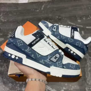 Louis Vuitton LV Trainer Navy White Monogrammed Denim Upper Asymmetrical Branded Strap Lifestyle Sneakers