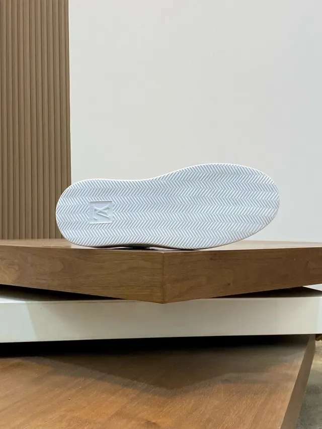 Louis Vuitton LV Trainer White Black Perforated Leather Upper Bold Side Logo Panel Lifestyle Sneakers 2