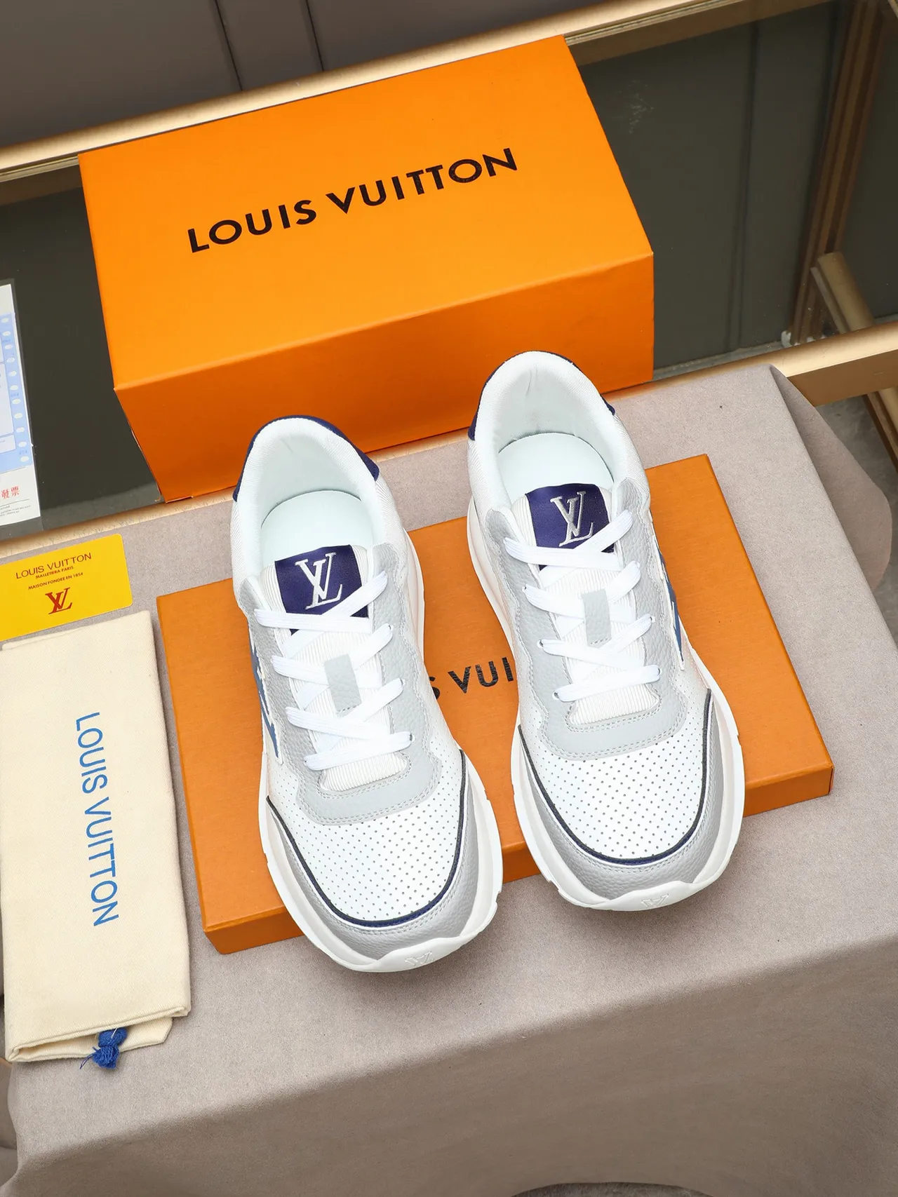 Louis Vuitton LV Trainer White Blue Perforated Leather Upper Embossed Midsole Branding Lifestyle Sneakers 2