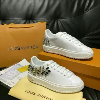 Louis Vuitton LV Trainer Zapatillas Lifestyle de Cuero Blanco y Dorado con Suela de Plataforma