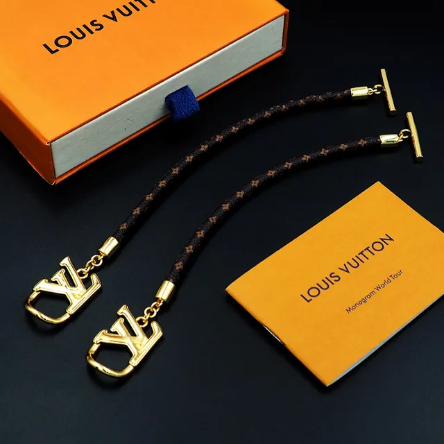 Louis Vuitton Monogram World Tour Gold-Tone LV Logo Bracelet 14