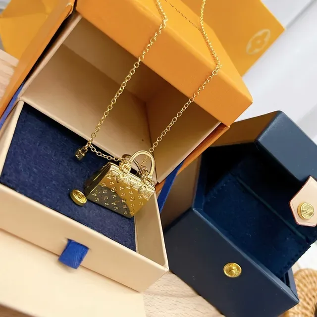 Louis Vuitton Petite Malle Gold Miniature Handbag-Shaped Monogram-Embossed Necklace 6