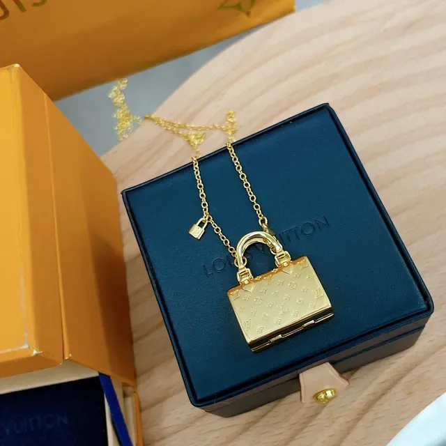 Louis Vuitton Petite Malle Gold Miniature Handbag-Shaped Monogram-Embossed Necklace 8