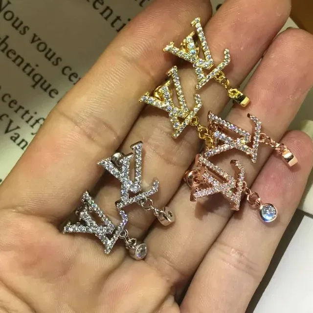 Louis Vuitton Silver Transparent Crystal-Pavé Monogram Dangling Drop Earrings 7
