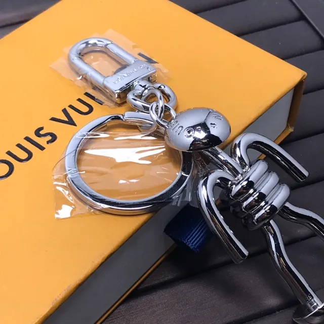 Louis Vuitton Stick Figure Silver Blue Polished Chrome Metal Articulated Silhouette Phone Accessory 2