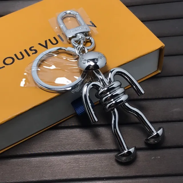 Louis Vuitton Stick Figure Silver Blue Polished Chrome Metal Articulated Silhouette Phone Accessory 3