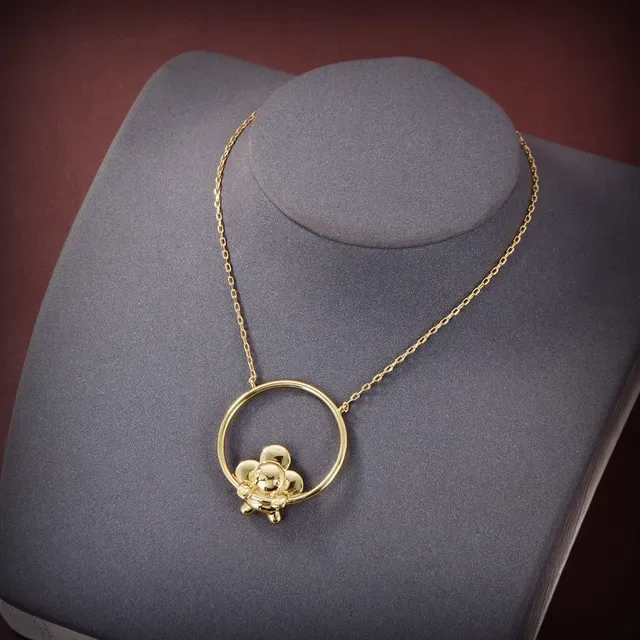 Louis Vuitton Vivienne Gymnast Boucles d'oreilles créoles dorées florales 3