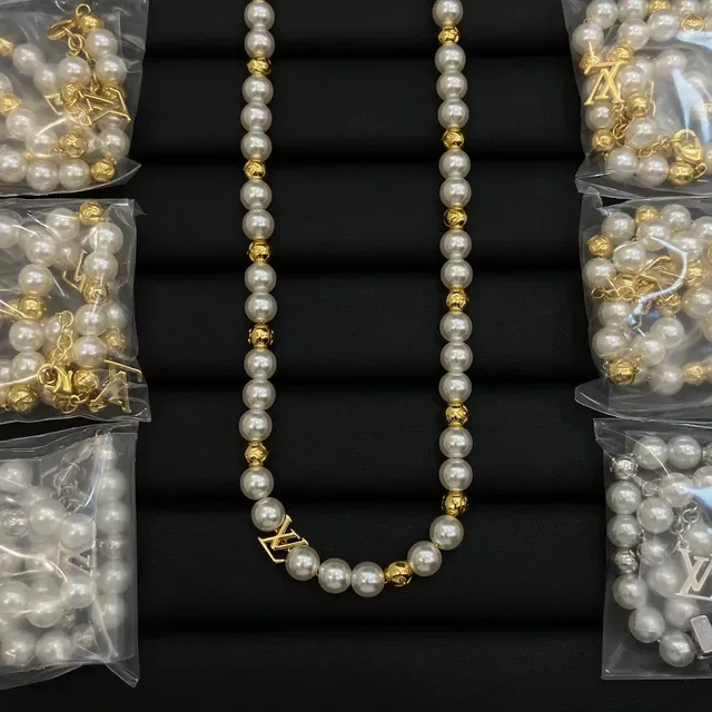 Louis Vuitton White Gold Pearl Strand LV Monogram Charm Necklace 2
