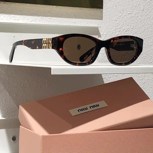 Miu Miu Arcadie Noir Or Silhouette Oeil de Chat Cadre en Acétate Lunettes de Soleil 7