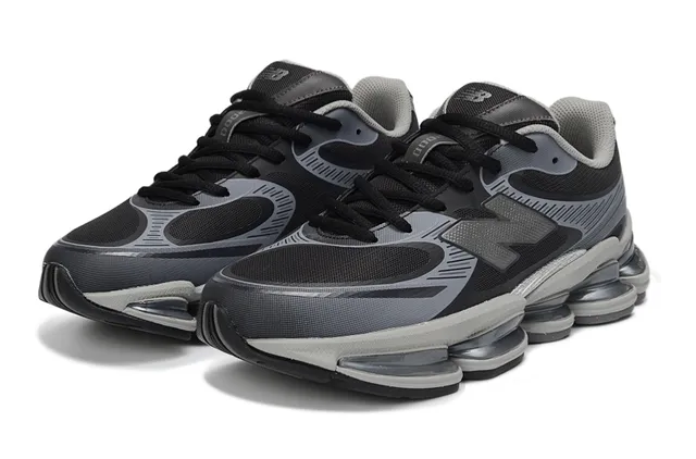 New Balance أحذية رياضية أسلوب حياة أسود رمادي وسط شفاف مقسم Pod شبكي وتداخل مواد اصطناعية 3
