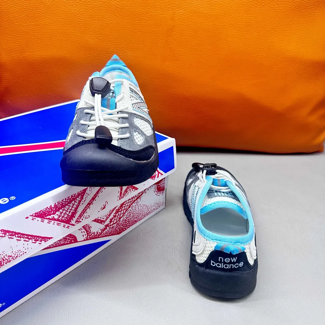 New Balance Tênis rosa roxo com upper de malha, sem cadarço, fechamento toggle 11