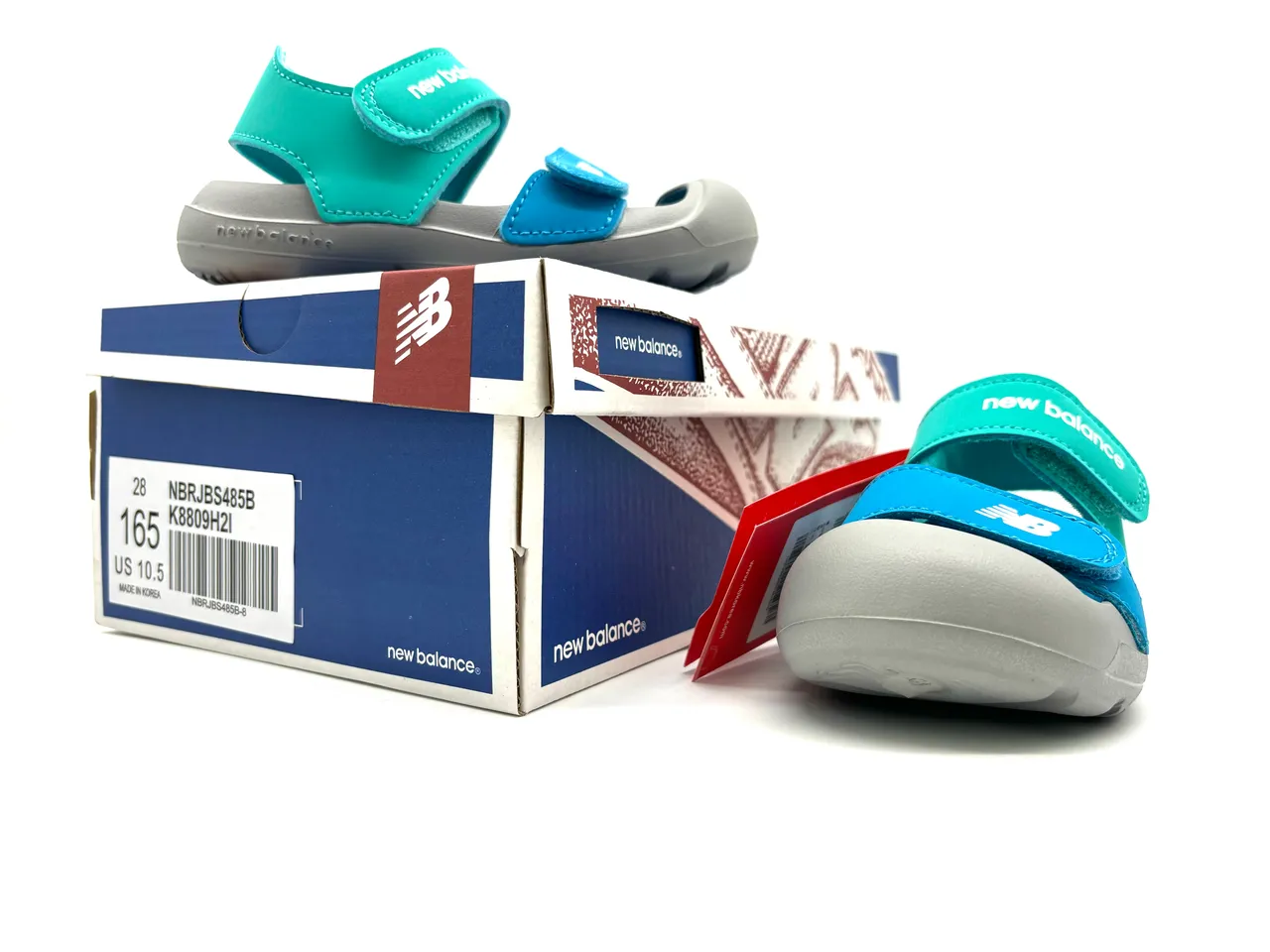New Balance Sandales Casual à deux brides avec fermeture Velcro semelle en caoutchouc moulé en violet et rose 18