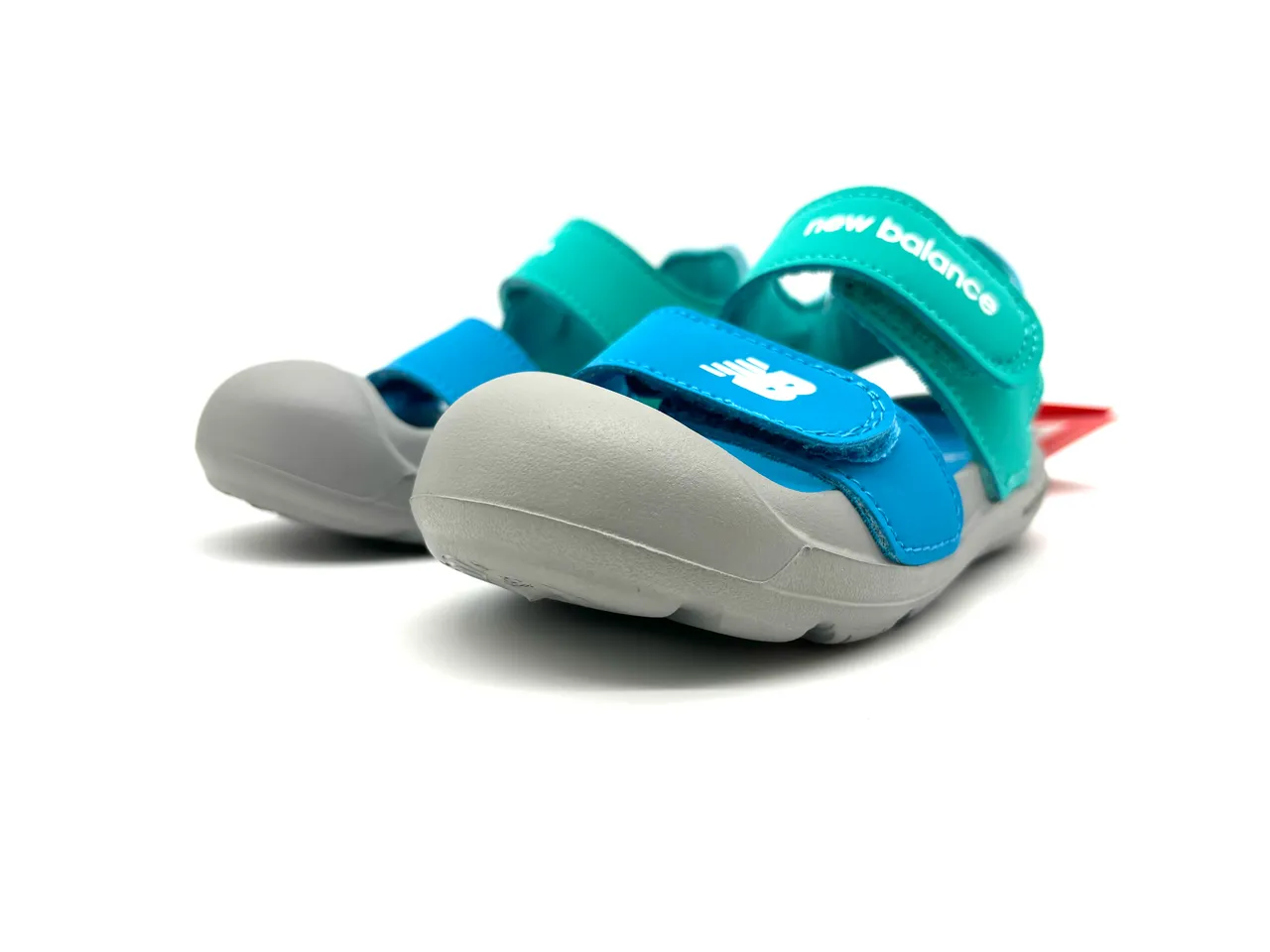 New Balance Sandales Casual à deux brides avec fermeture Velcro semelle en caoutchouc moulé en violet et rose 19