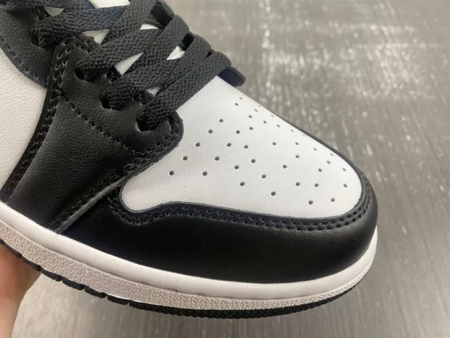 Nike Air Jordan 1 Low White and Black Lifestyle Sneakers 6